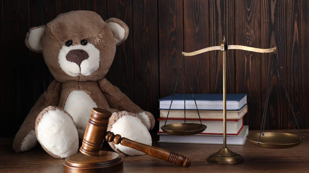 Toy bear and judge's gavel