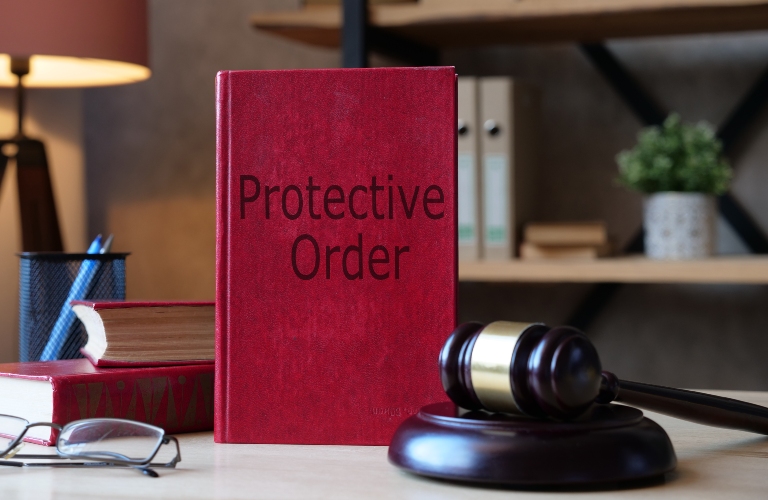 Protective Order is shown on a photo using the text